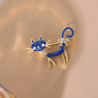Fancy metal brooch with blue cat and rhinestones