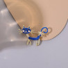 Fancy metal brooch with blue cat and rhinestones