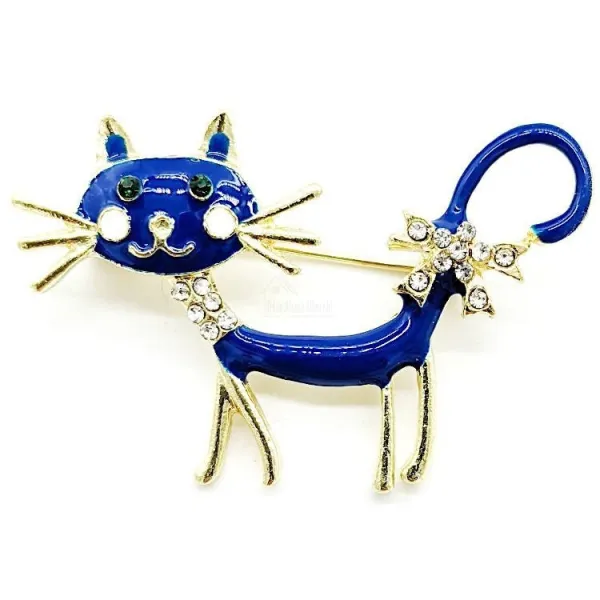 Fancy metal brooch with blue cat and rhinestones