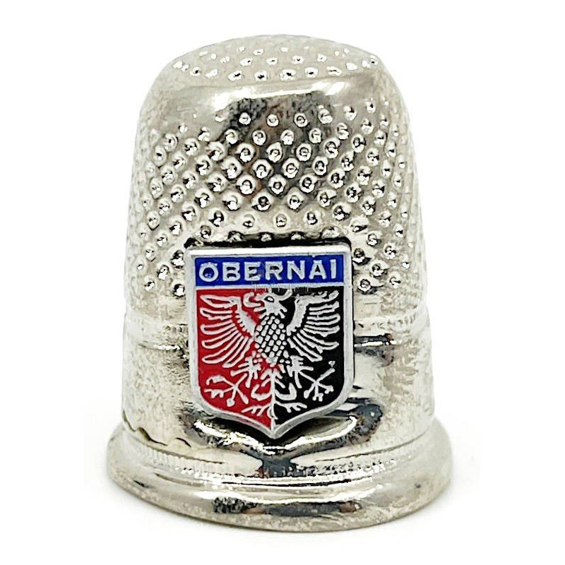 Metal thimble with Obernai crest
