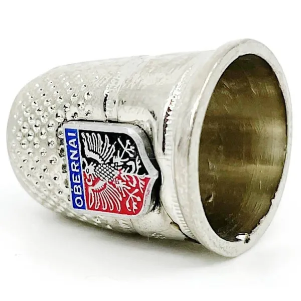 Metal thimble with Obernai crest