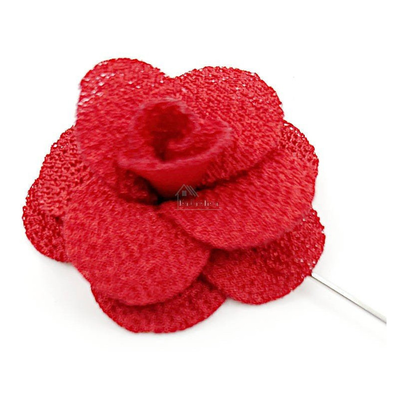 Pink fabric brooch with metal pin