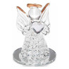 Decorative glass angel with transparent heart on mirror base