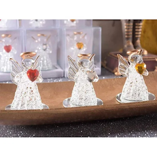 Decoratieve engel in glas met oranje hart en spiegelvoet