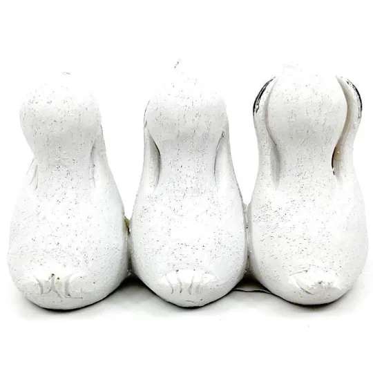 Resin storks see nothing, say nothing, hear nothing